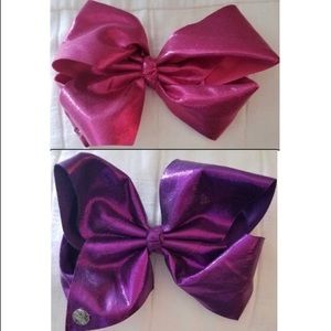 Two large metallic Jojo Siwa bows